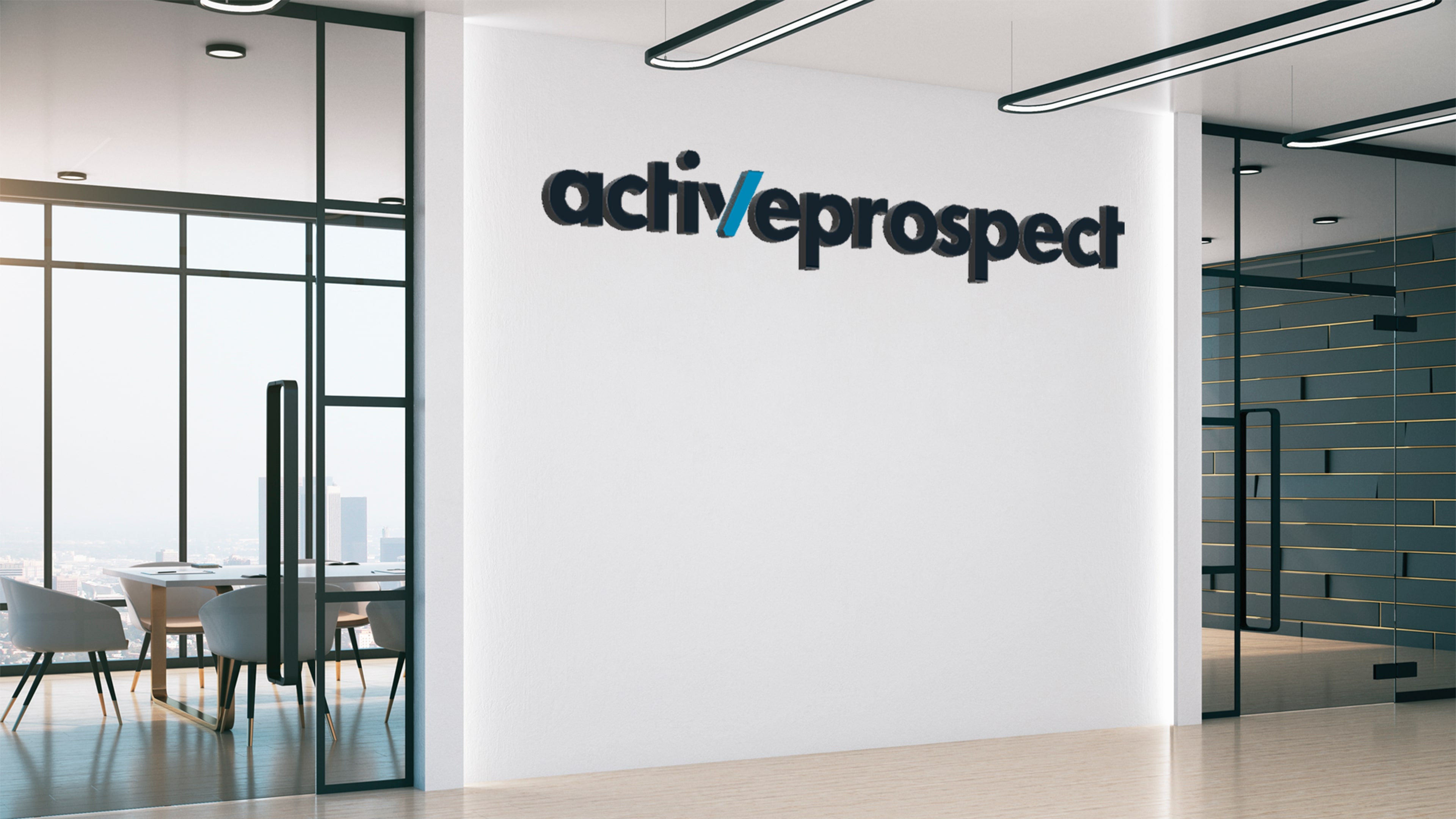 Modern office interior with glass walls, a conference room with white chairs and table, and a wall displaying the ActiveProspect logo.